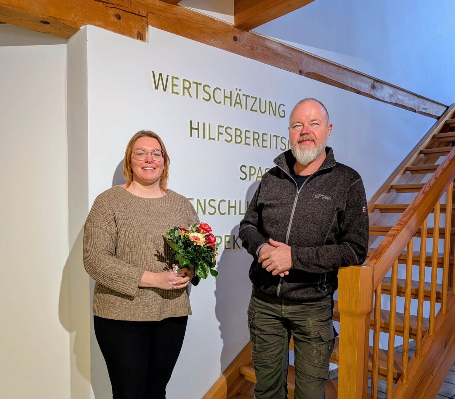Anna-Lena Grüneweg und Wilhelm Pesel lächeln in die Kamera.