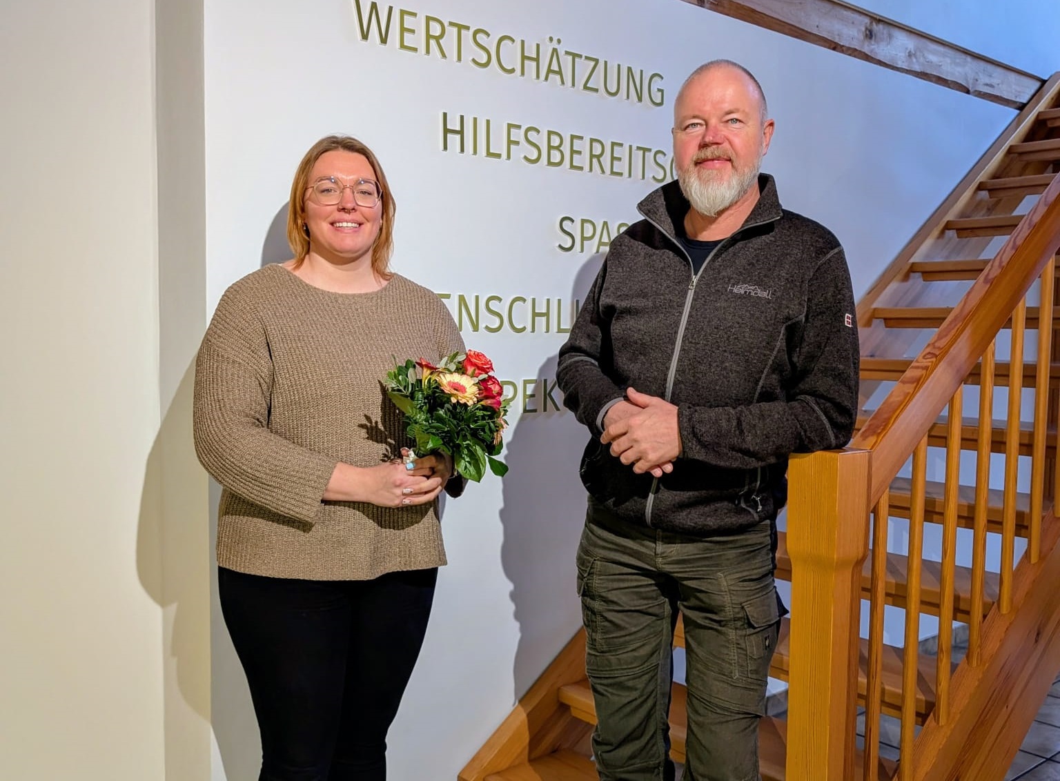 Anna-Lena Grüneweg und Wilhelm Pesel lächeln in die Kamera.