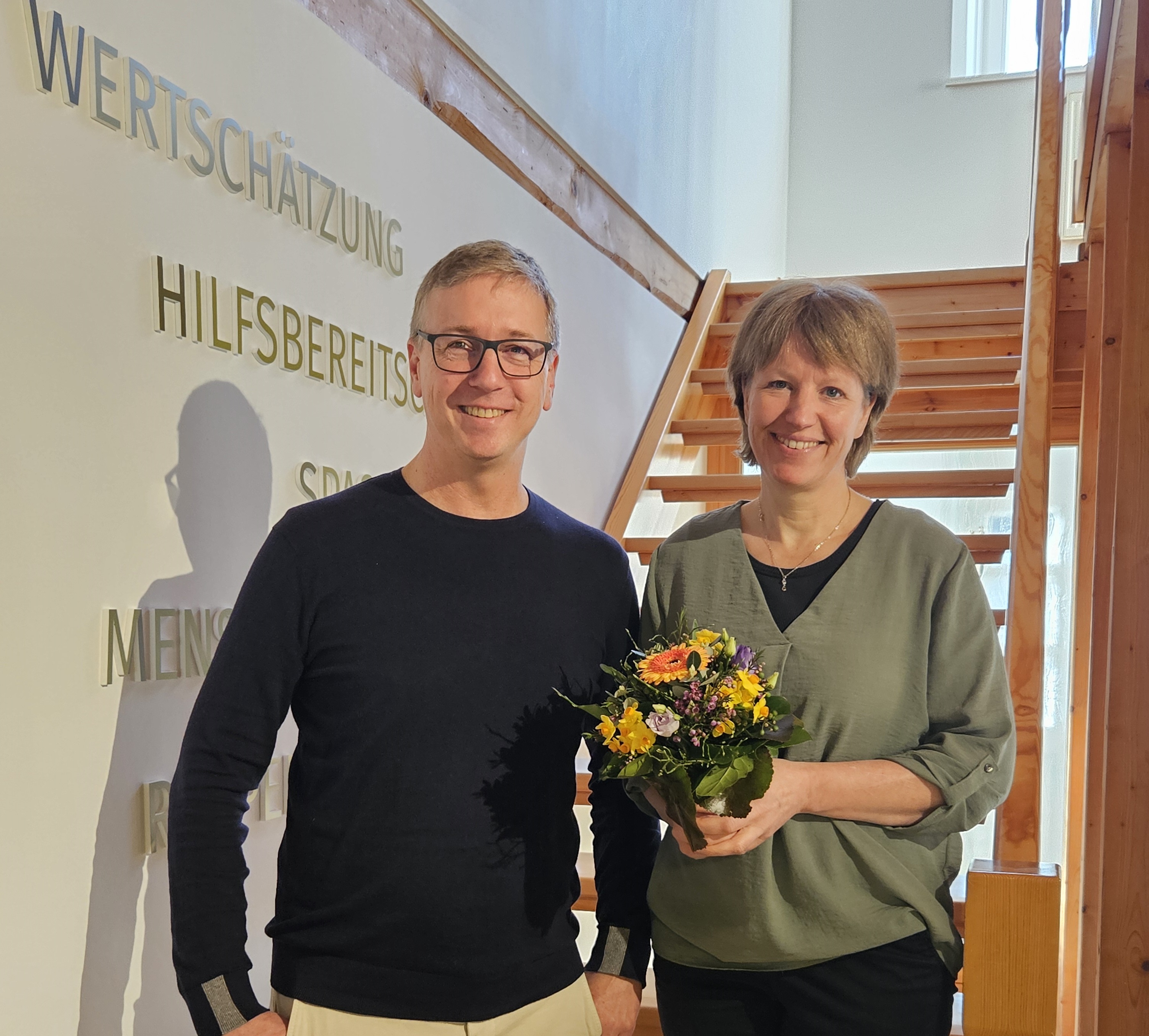 Fabian Martens und Julia Bieber lächeln in die Kamera.